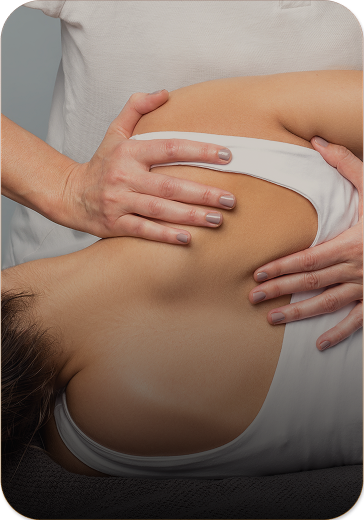 woman receiving postpartum chiropractic care
