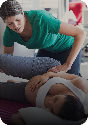 pregnant woman receiving prenatal chiropractic care