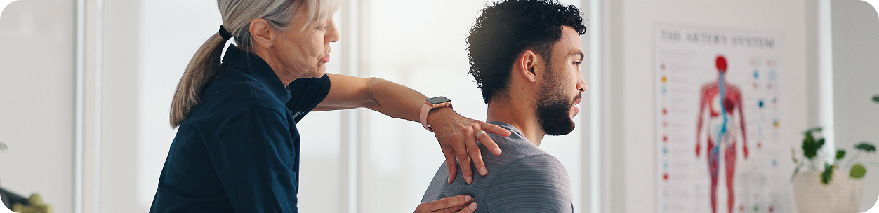 chiropractor giving a back massage